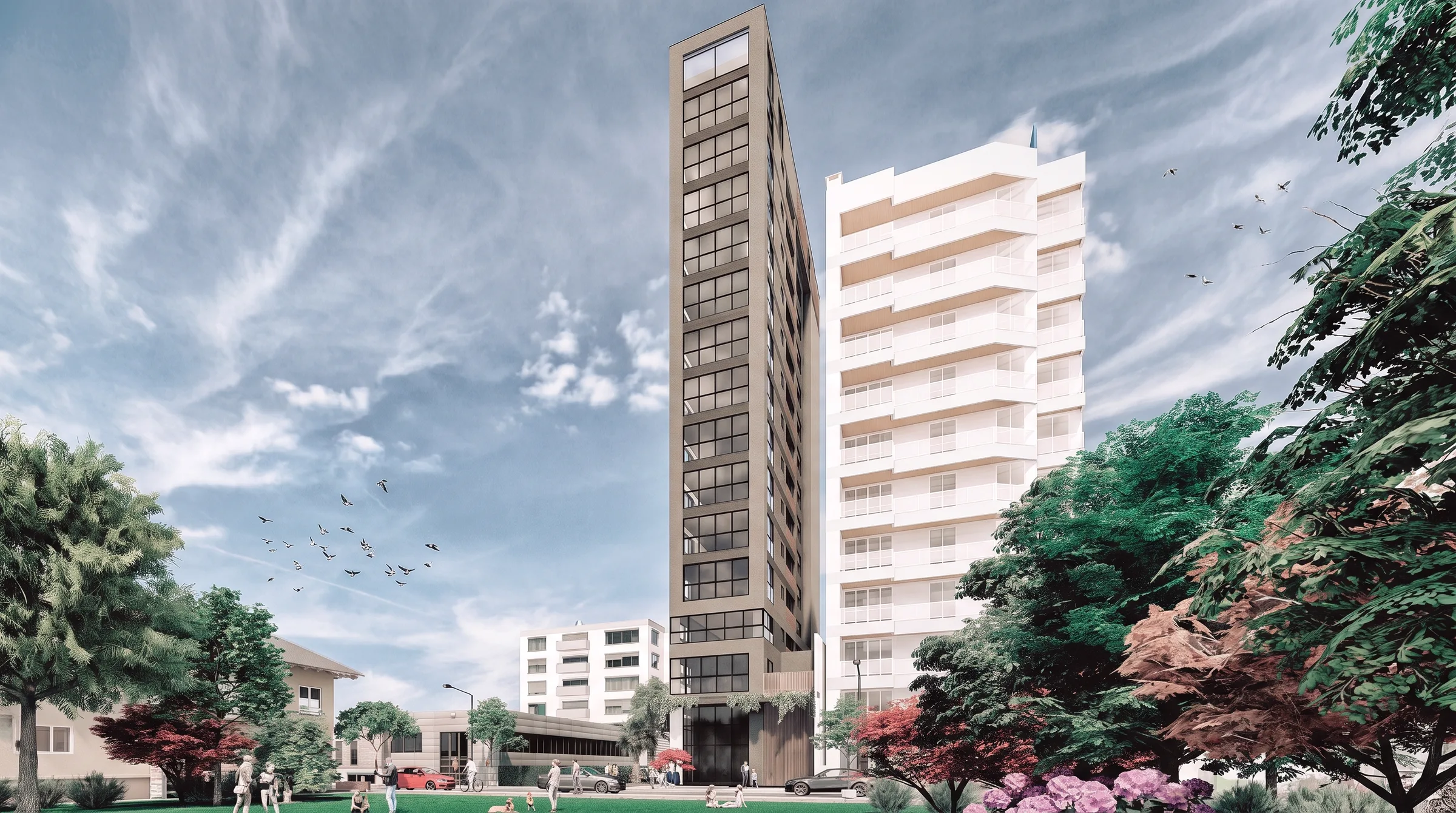 Fachada do Kowalski Residencial vista da rua, com a torre e o prédio vizinho ao fundo.